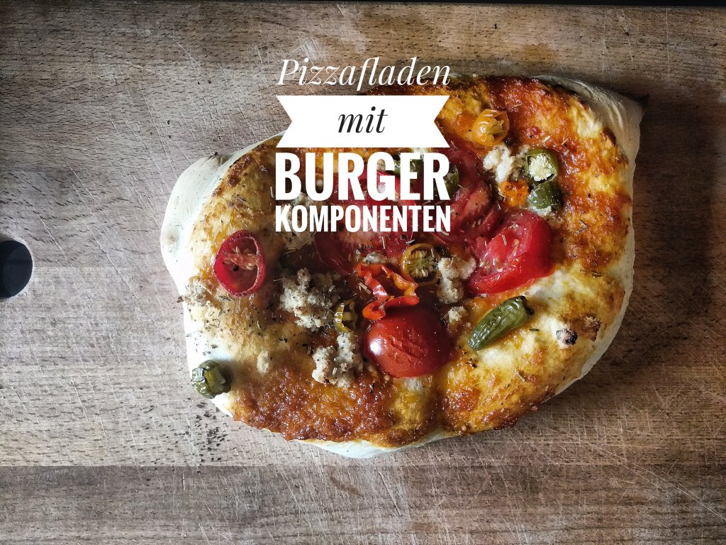 Pizza als Fladen mit Resten vom Burger Essen